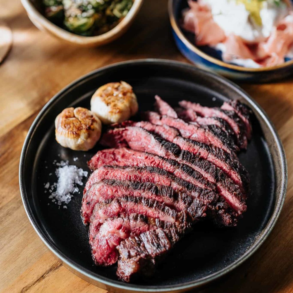 Steak with garlic confit