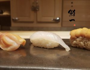 Three fresh Nigiri sushi plated