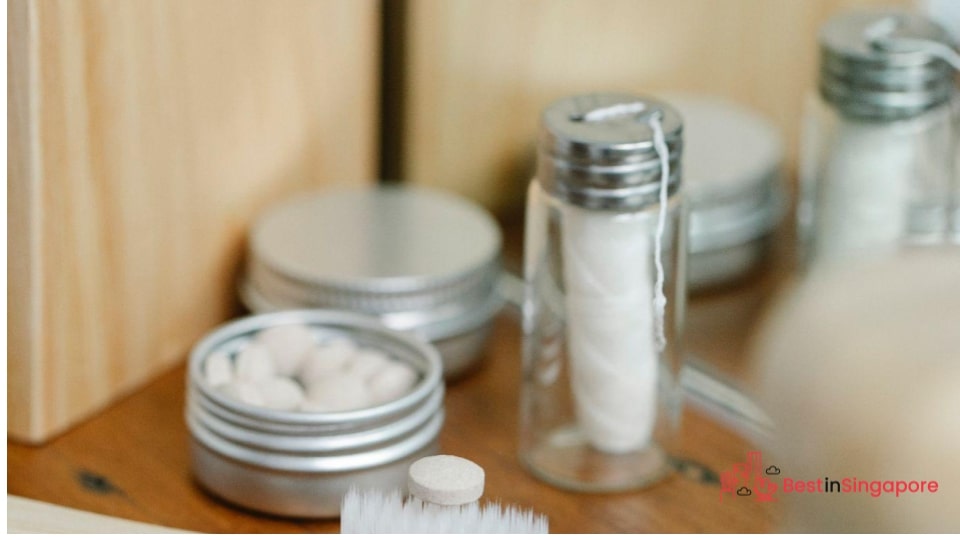 Run a dryer sheet or dental floss on flyaways