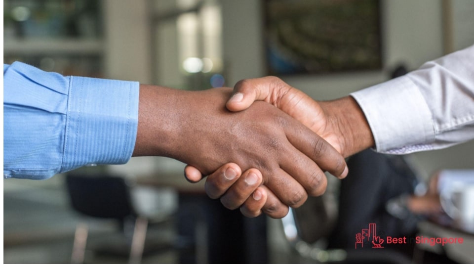 With a Handshake