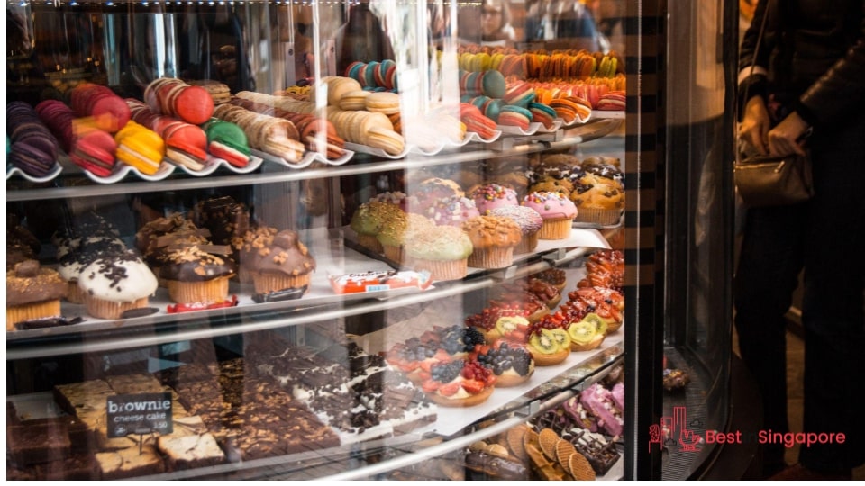 Unsold food on display is thrown away at the day’s end