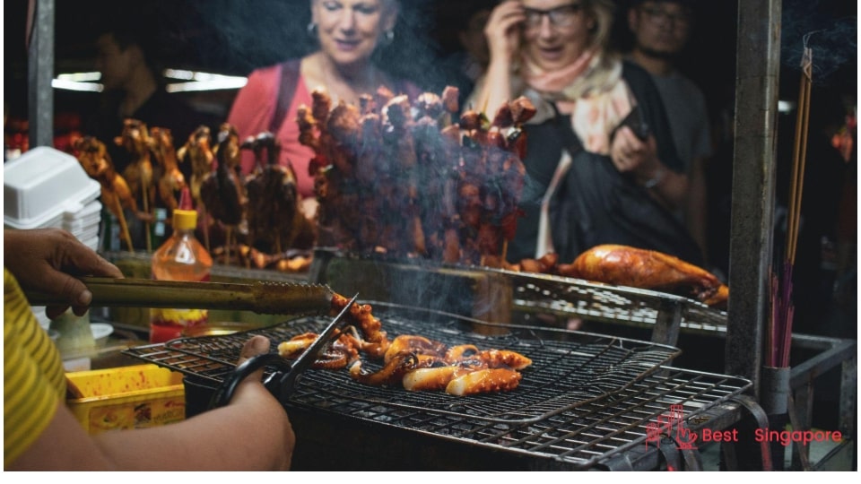 Have lunch or dinner at a hawker centre