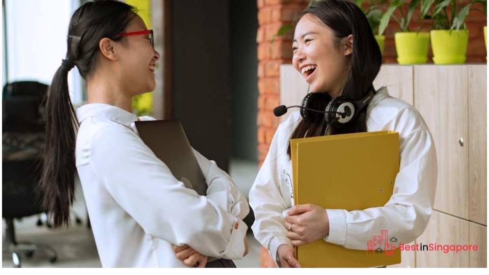 When was Singapore’s bilingual policy implemented