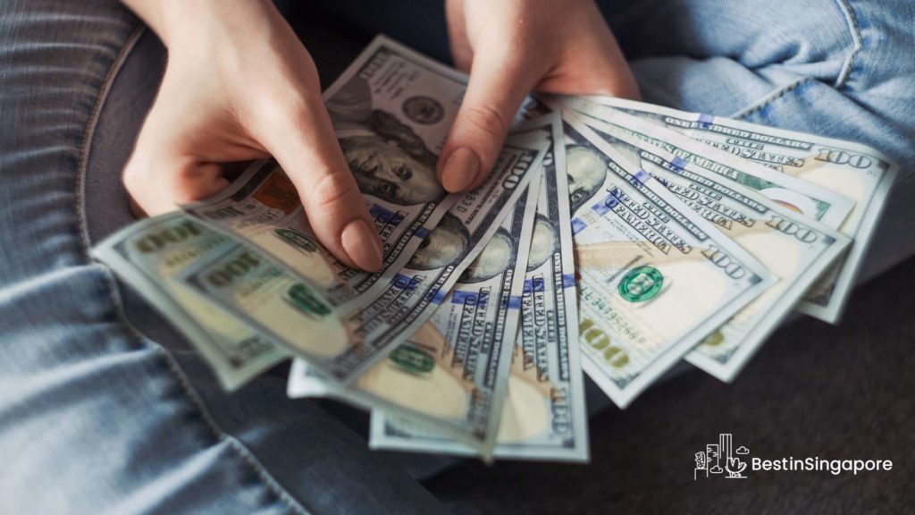 What’s the median monthly income in Singapore
